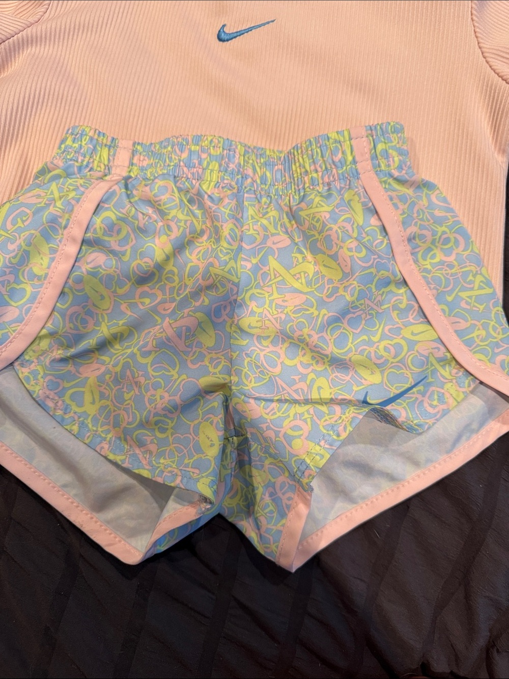 Nike Pastel Pink Ribbed Crop Tee with Blue-Accented Floral Running Shorts - Picture 4 of 4
